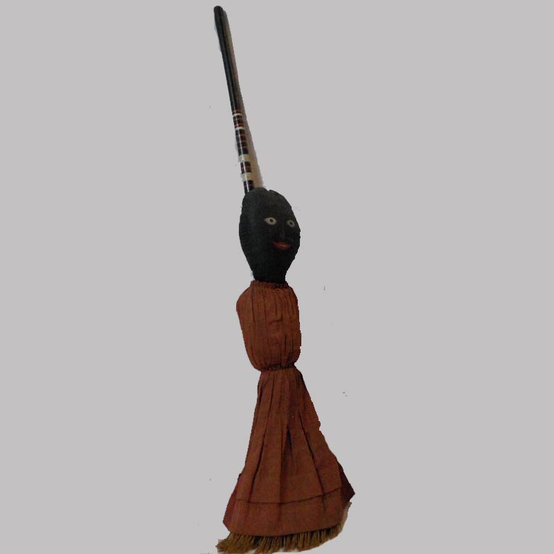31-22354, Folk art figure, black doll broom, in red dress, early 20th c, 32"H. $1,450